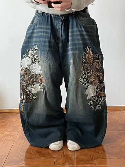 Szerokie baggy rap spodnie haft swag affliction opium